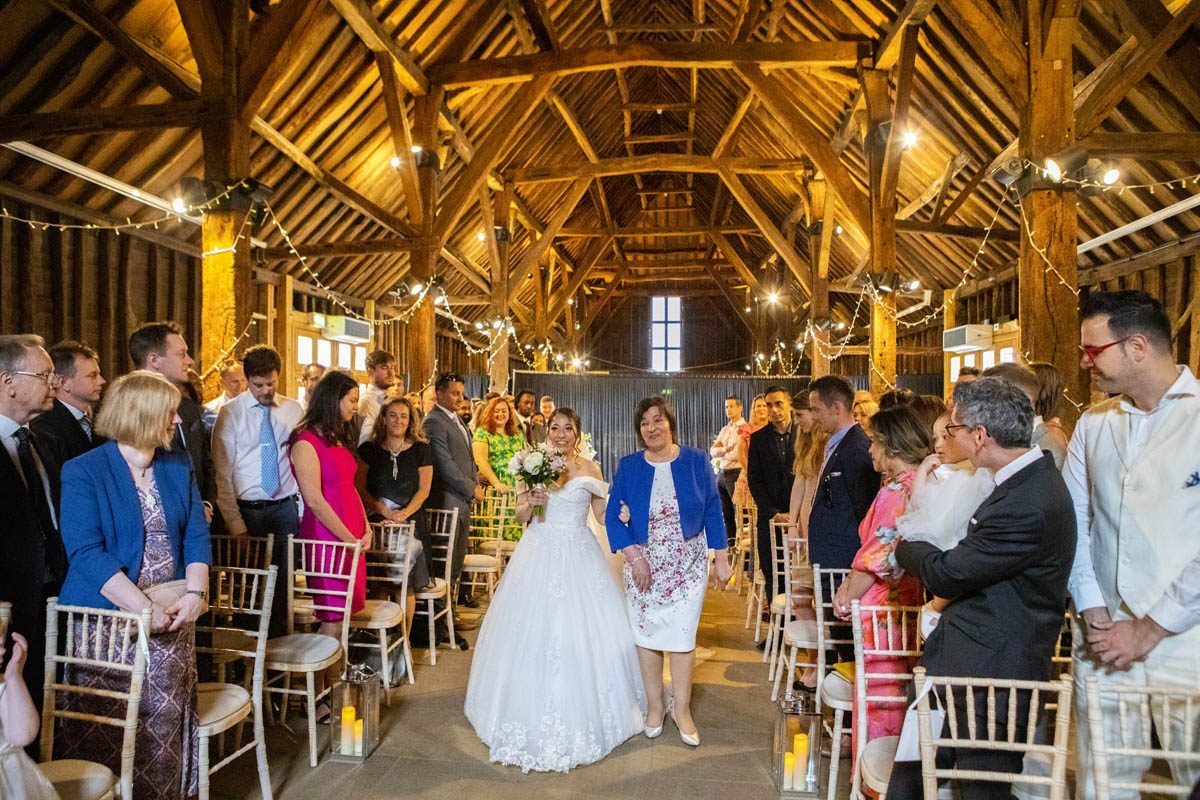 Wedding couple in front of The Great Barn in Ruislip